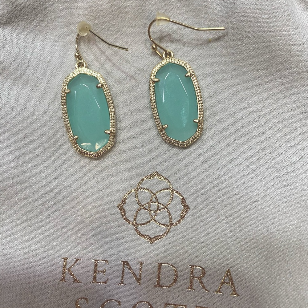 Kendra Scott Dani Drop earrings. Light mint green color and gold trim